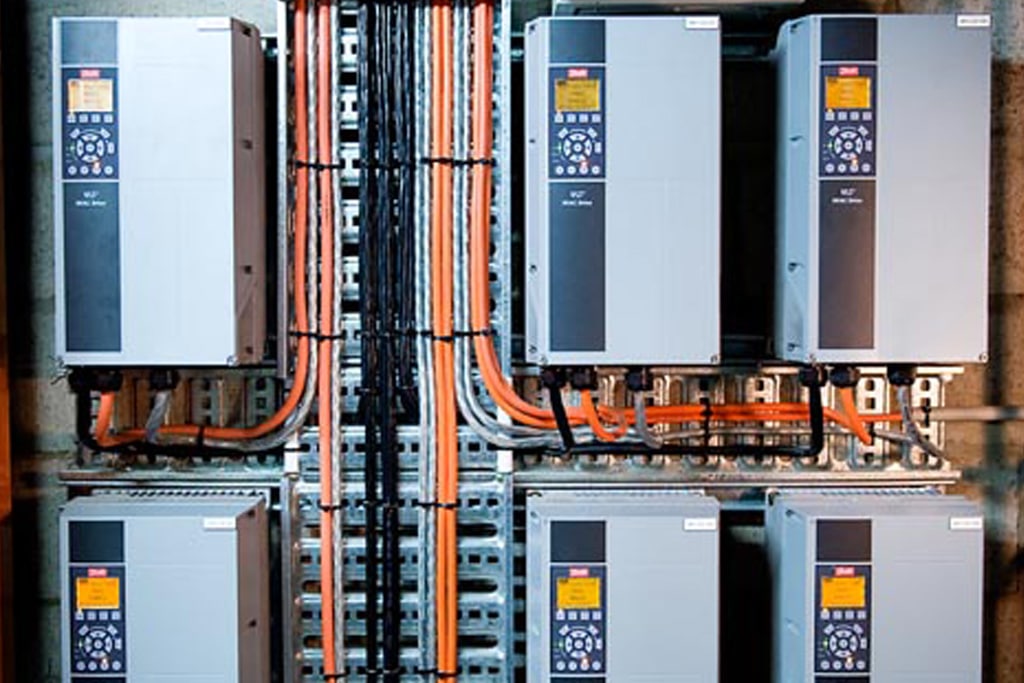 Mechanical and electrical services installation with power drives, electrical control systems, and structured cabling.
